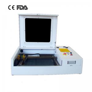  50w 4040 laser engraving cutting machine with CO2 laser tube and golden laser head Manufactures