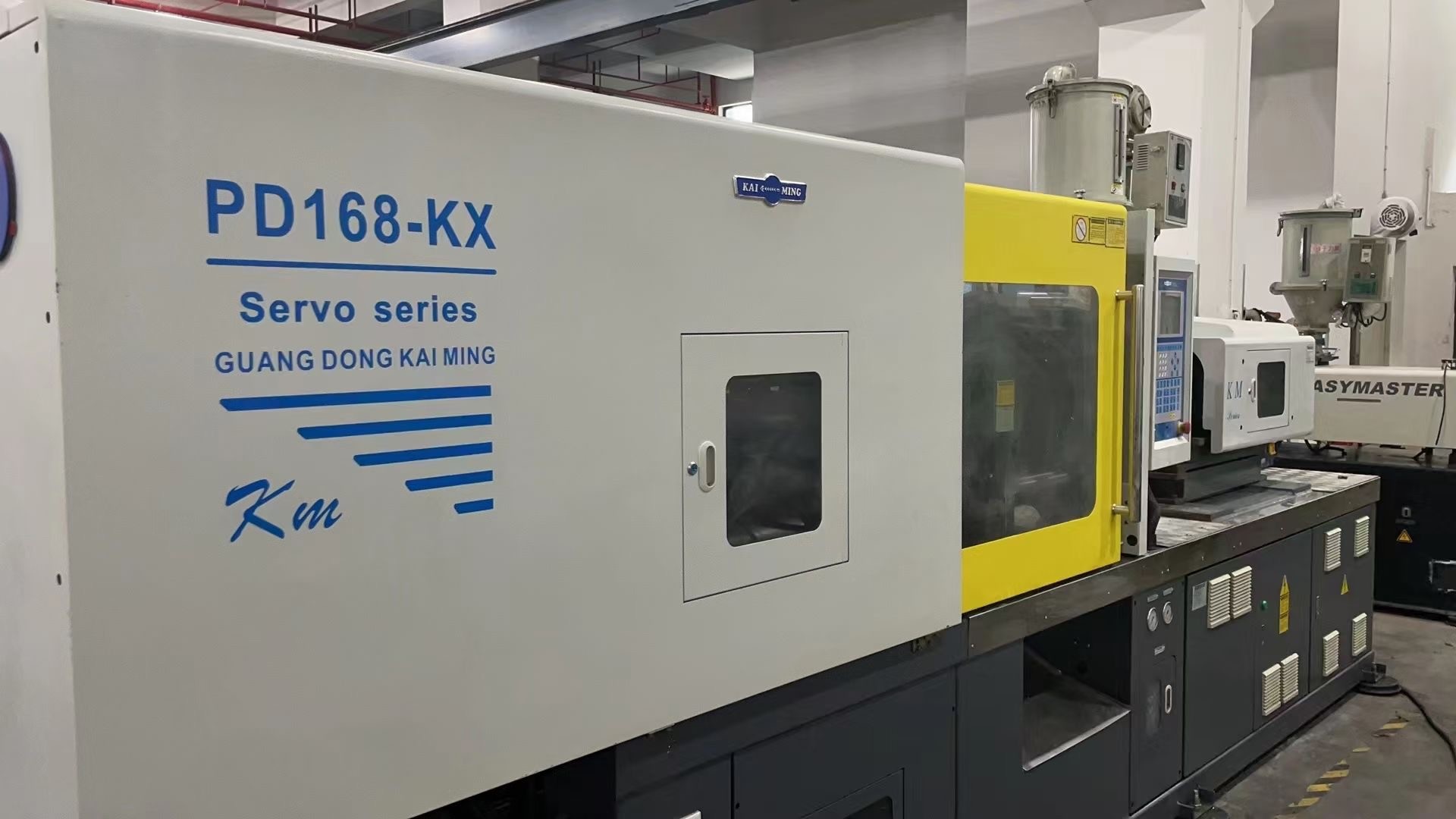  Hydraulic Thin Wall Injection Molding Machine Sevor Motor Used Kaiming PD168-KX Manufactures