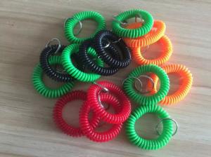 China Colorful wrist badge accessories stretchable wrist coil bands plastic promotional key ring on sale