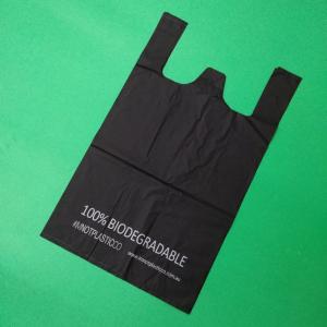 China 100% biodegradable and compostable Starch T-shirt bag, black color, size 0.025mm x (30+15)x50cm, withstand 5kg on sale