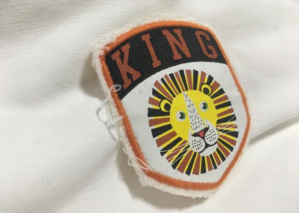 Quality Merrow Border Custom Stitched Patches , Clothing Iron On Embroidered Patches For T Shirts for sale
