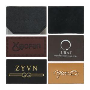 China PMS Faux Custom Leather Labels Clothing Handbag Tagger Vegan Merrow Border on sale