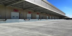  Wind Resistance 450N/m2 Industrial Sectional Doors Garage Insulated Steel Doors Manufactures