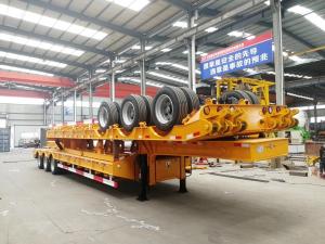 China 100T Low Bed Heavy Duty Semi Trailers / 3 Axle Lowboy Trailer In Mechanical Suspension on sale