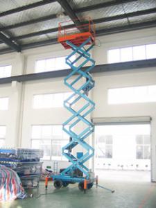  Motorized scissor lift with loading capacity 500Kg and 9M Lifting Height and Extension platform Manufactures
