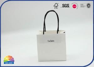 China 4c Printed Customized Logo White Kraft Paper Shopping Bag With Paper Handle on sale