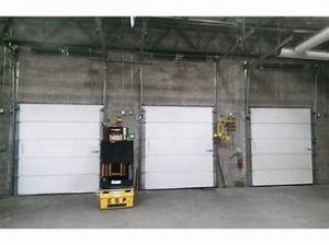  Exterior Roll Up Overhead Sectional Industrial Vertical PU Panel Insulated Workshop Dock Doors Manufactures